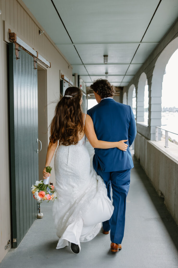 bride and groom candid photo, bridal bouquet, wedding hair