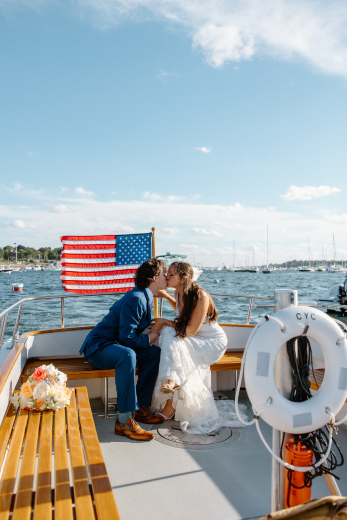 waterfront wedding, summer wedding, bride and groom on boat