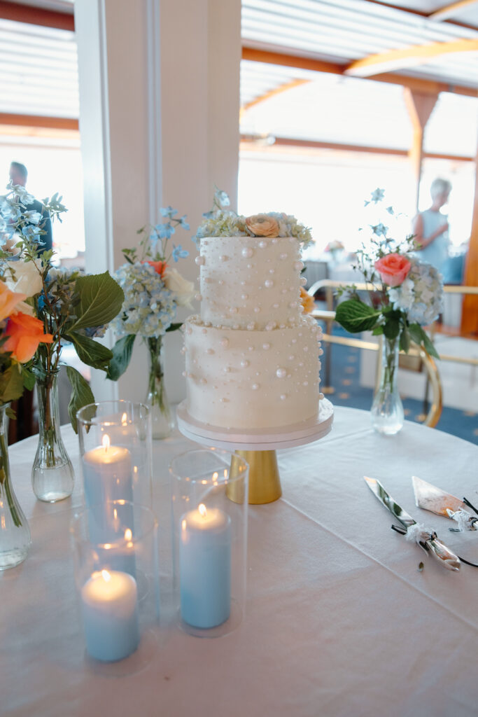 wedding cake with pearl accents 