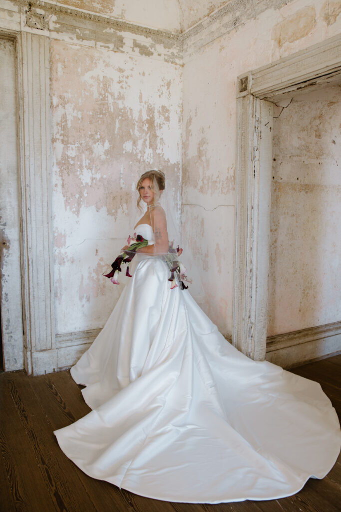 bridal portrait justin alexander signature dress calla lily bouquet