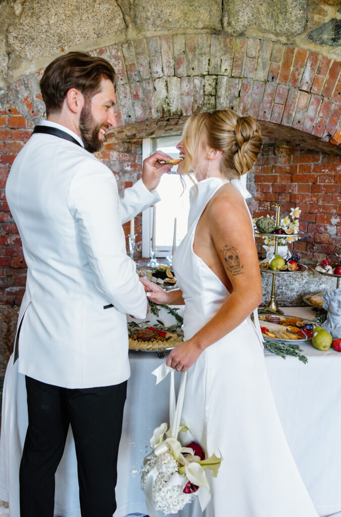 charcuterie grazing table wedding bride and groom 