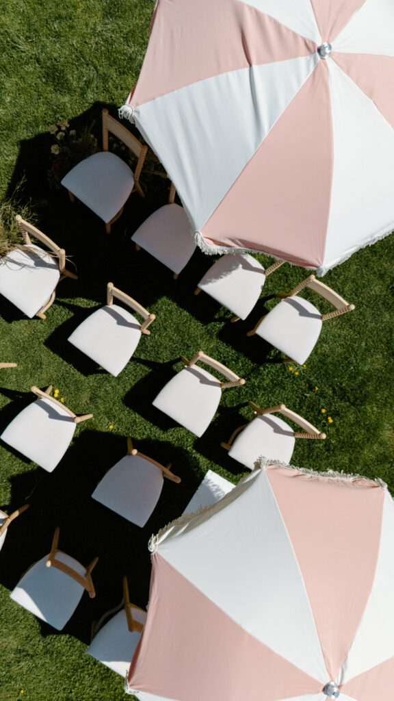 pink wedding ceremony umbrellas